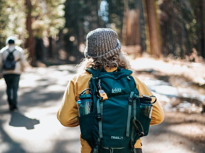 Discount promos are not how REI gets members. REI Member hiking, Photo by Tyler Nix