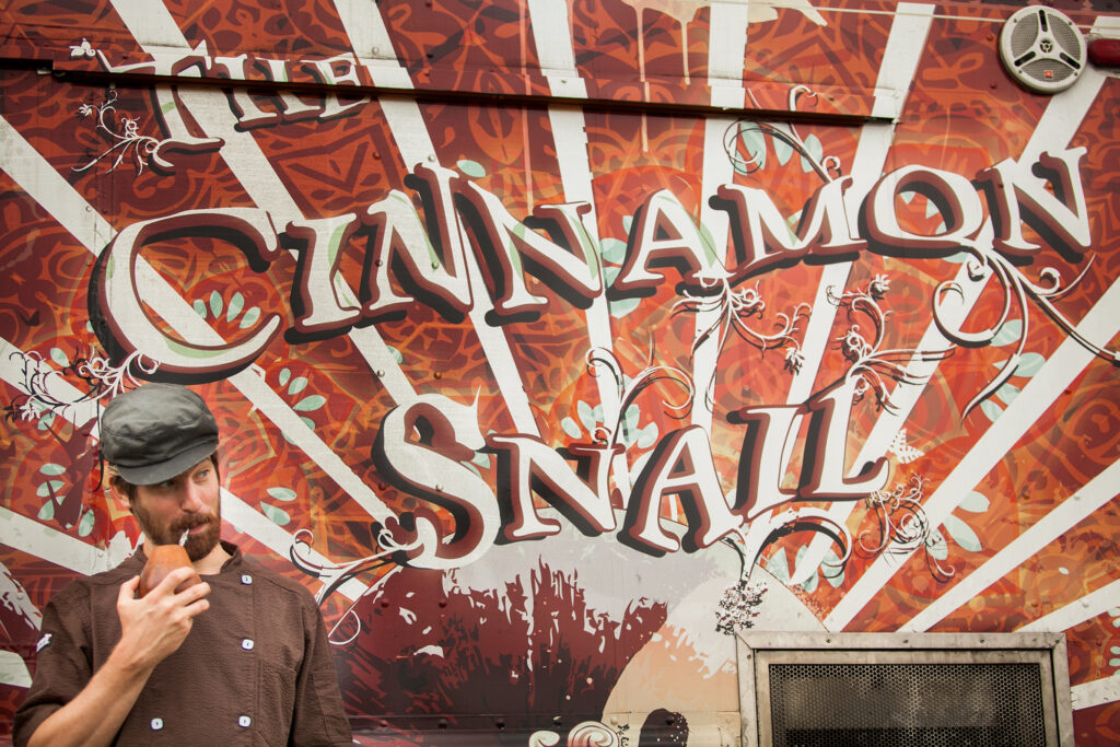 Chef Adam Sobel in front of his Food Truck, The Cinnamon Snail