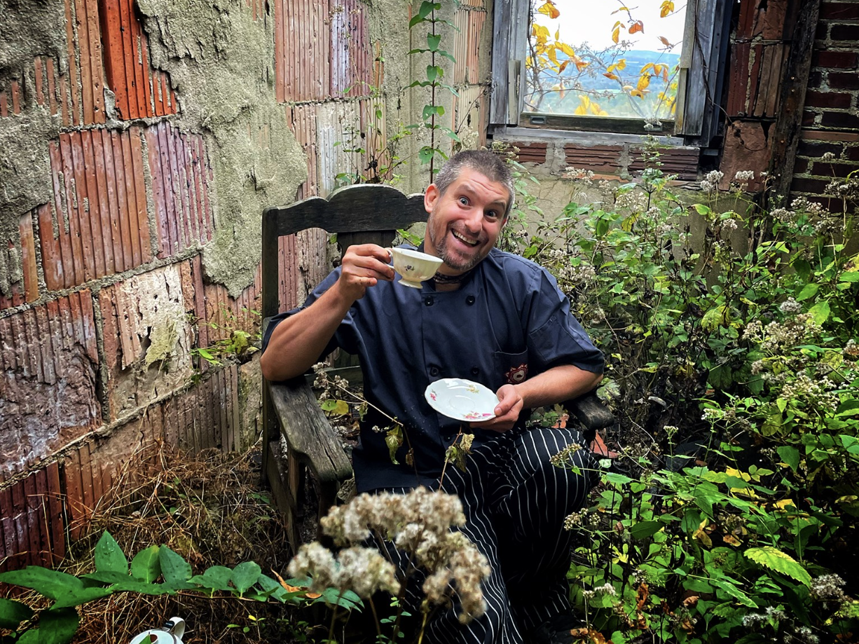 Chef Adam Sobel enjoying a cup of tea during his travels